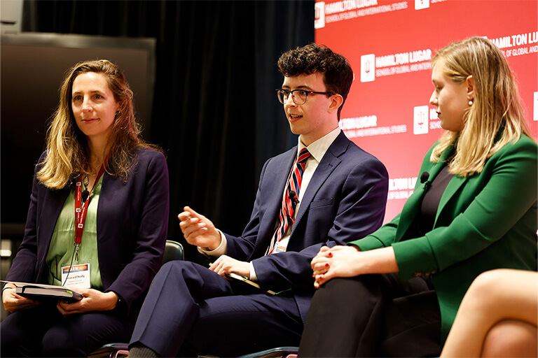 Panelists speaking on a panel at ARW.